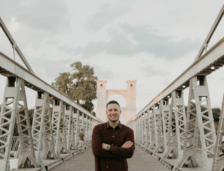 Photo of Jonathan Pokluda on bridge