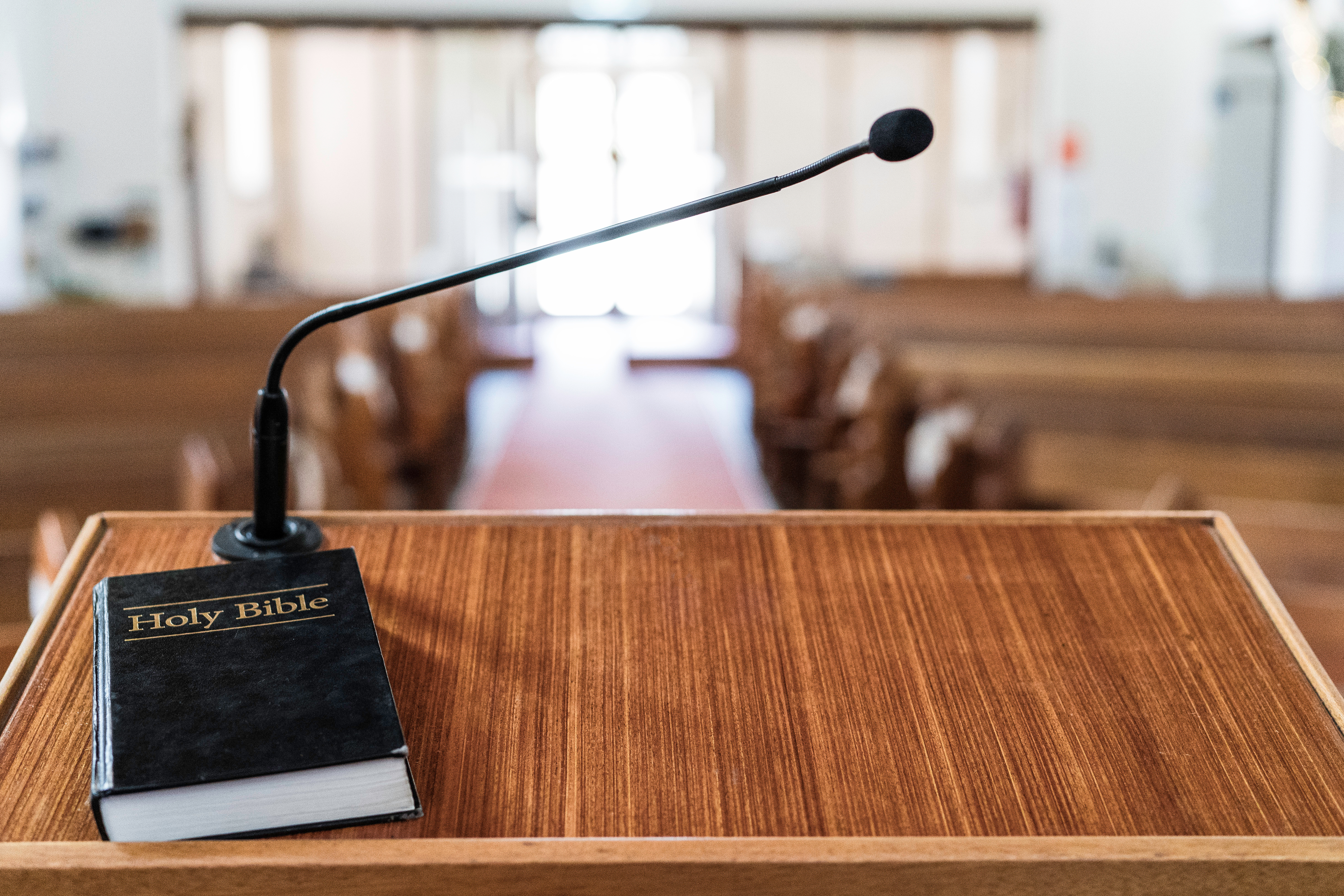 Bible,On,Pulpit,In,Church,,With,Light,Coming,In,Through