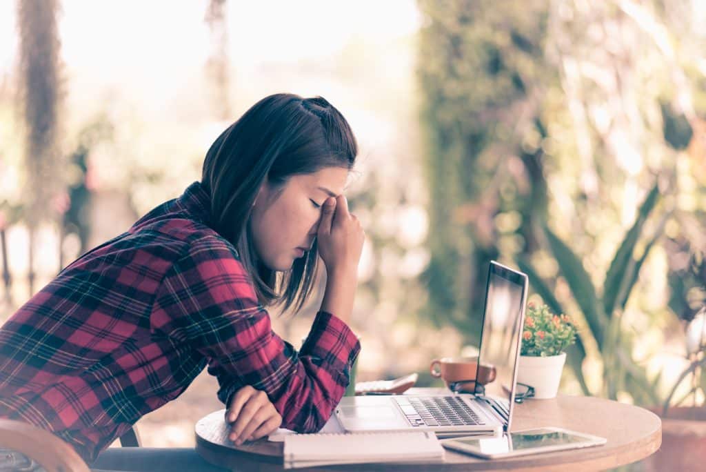 A cynical Christian looking at a laptop